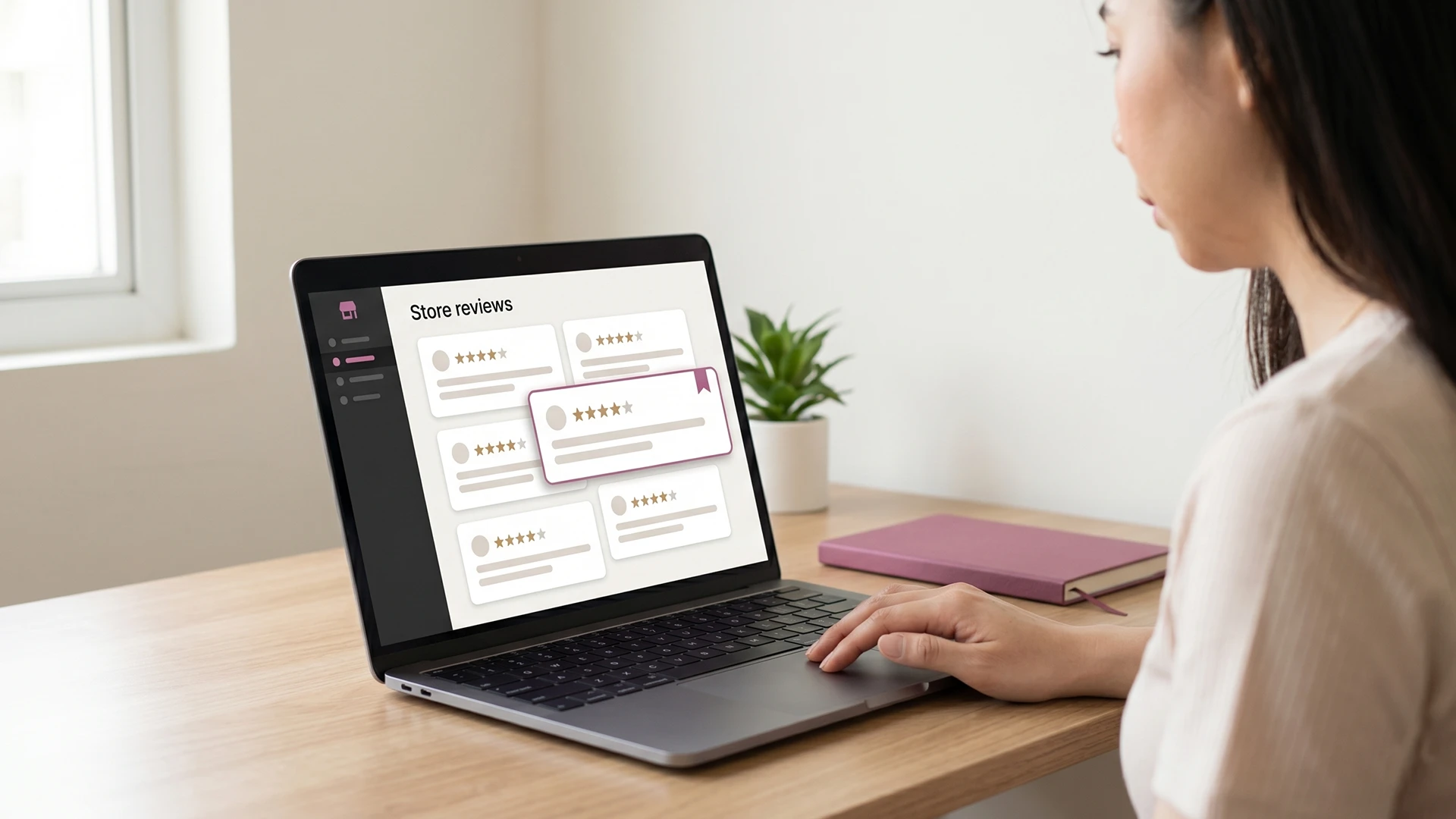 Shopify owner reviewing a flagged one-star product review on a laptop dashboard