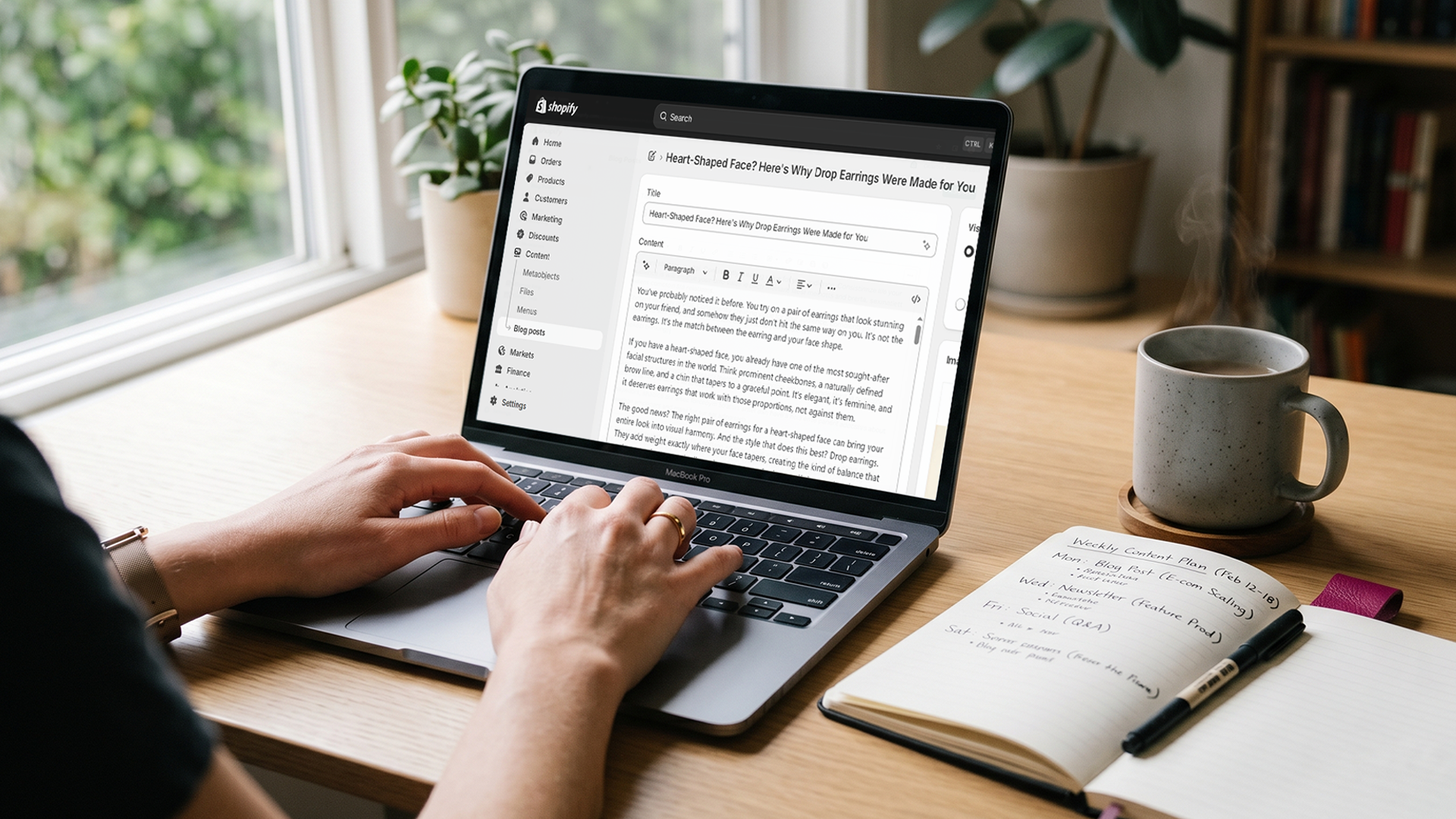 Solo Shopify founder at a clean desk writing a blog post in the Shopify admin, planning Shopify blog SEO