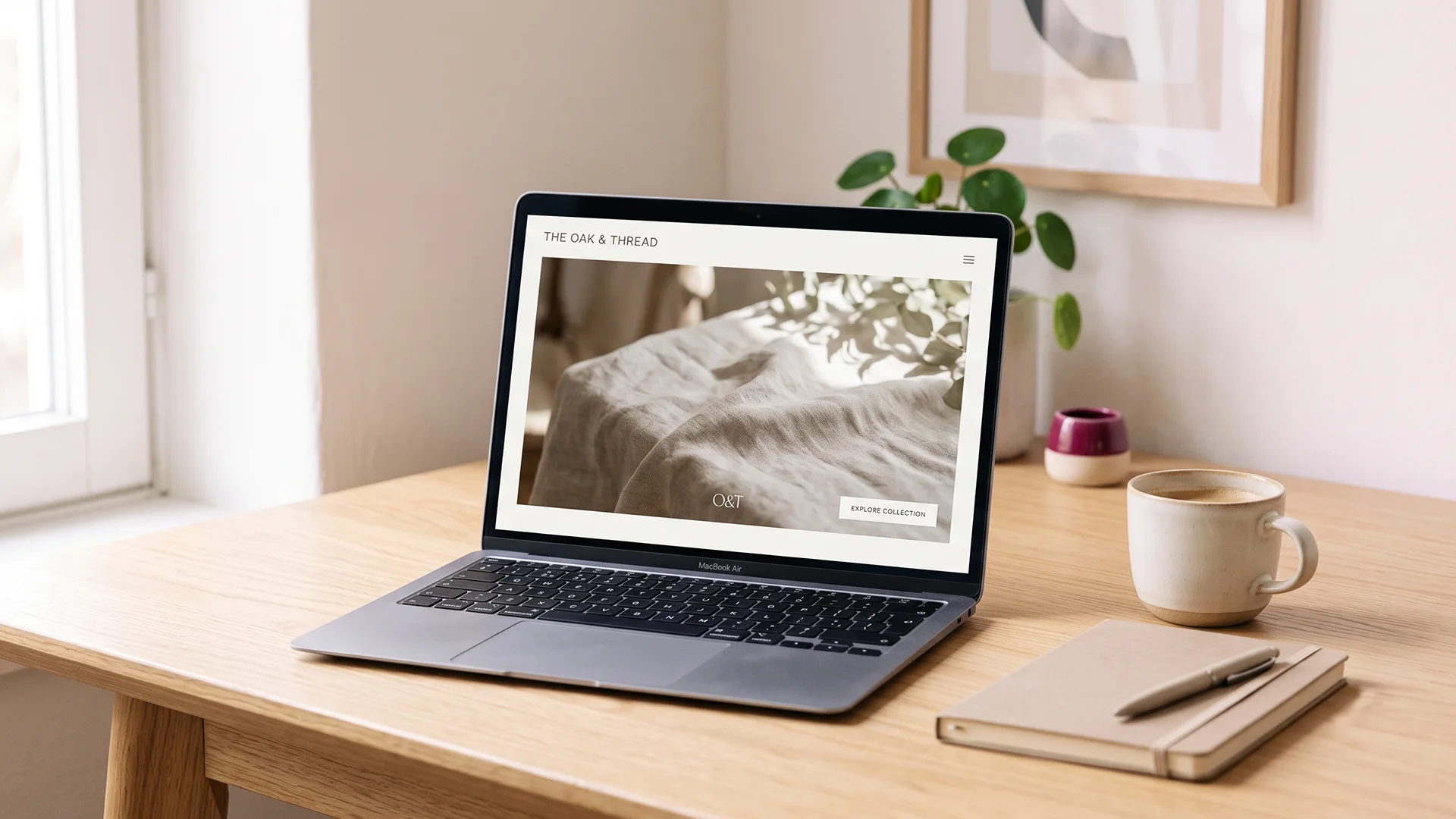 Shopify home page open on a laptop showing a hero image with almost no text