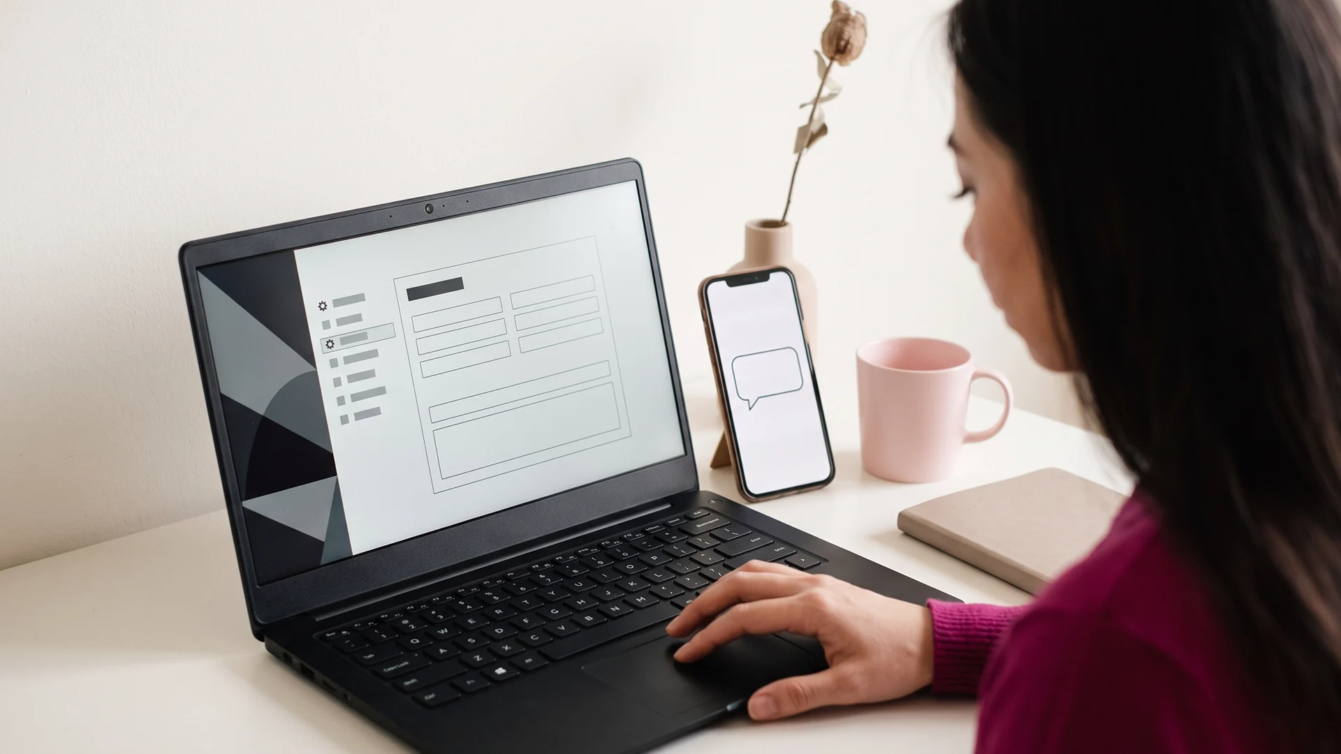 Shopify store owner configuring the Shopify Inbox AI agent settings on a laptop